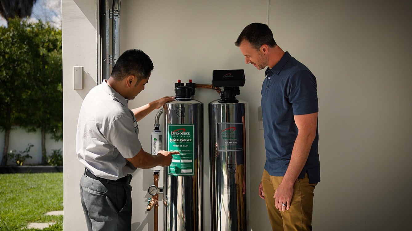 Dad with Installer at tanks