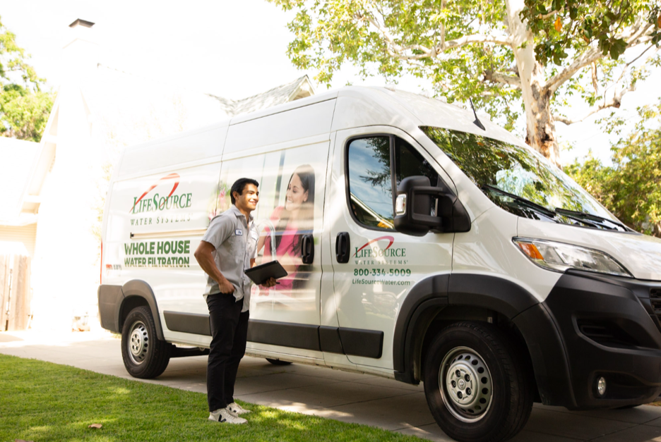 LifeSource delivery van arriving at a home