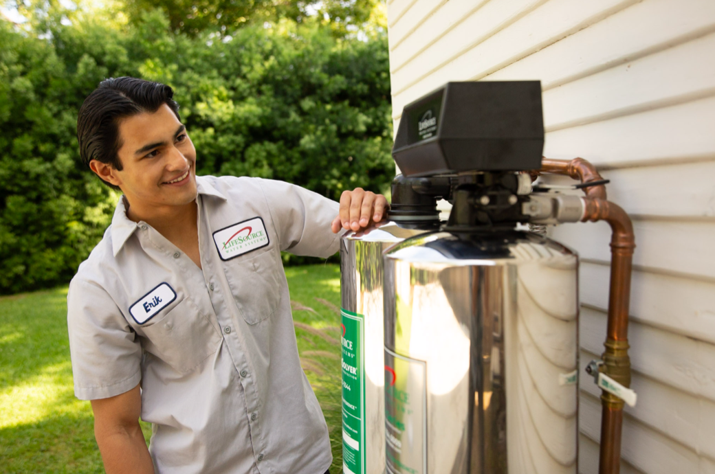 LifeSource technician checking a whole house filtration system