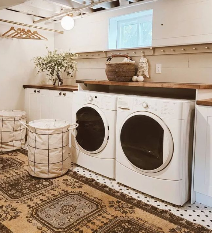 Laundry room where a whole house water filter can connect near the main water line