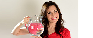 woman holding a pitcher of water in her hands