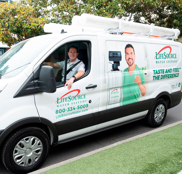 Factory installation team arriving at customer home