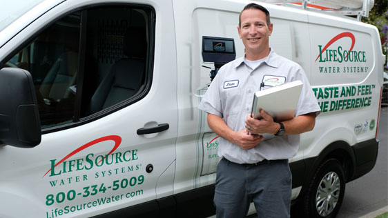 lifesource water driver next to his van