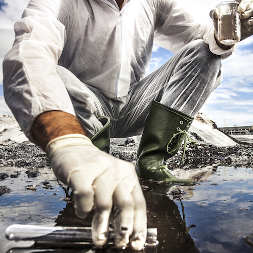 a scientist testing the water