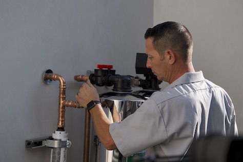 a mechanic making sure of the installation